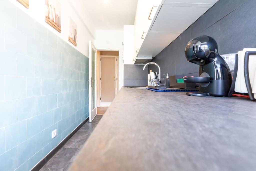 Beachome4u4 / Carcavelos Apartment Parede